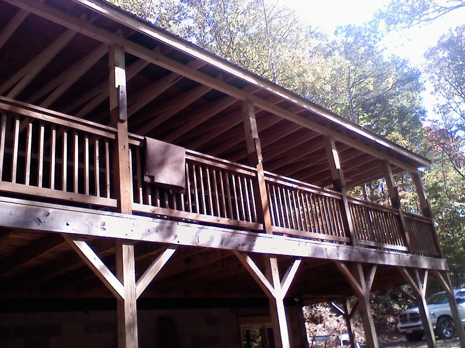 Timber framing under a new elevated porch and deck — Roof Leak Repair in Bluewater by Roofing Brothers